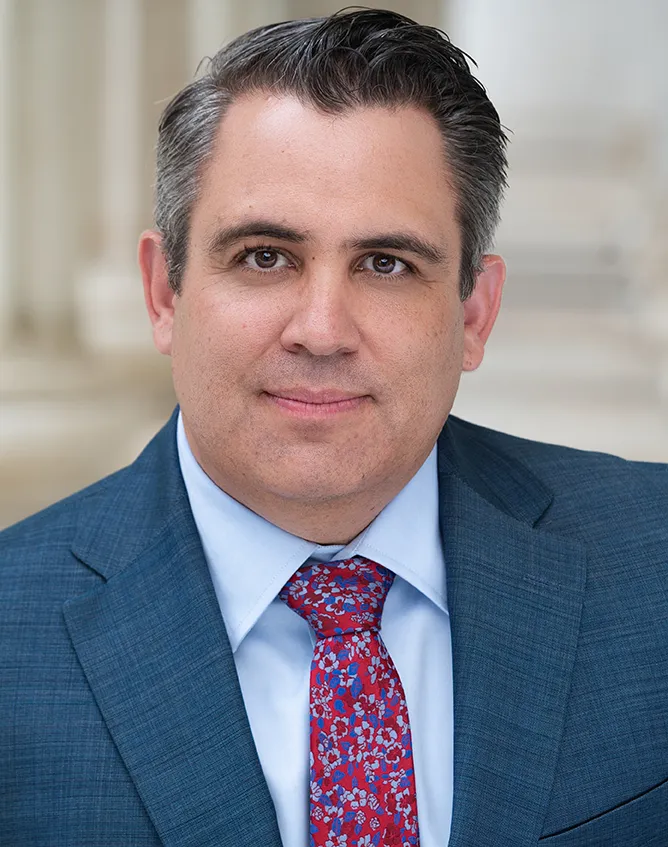 Joshua D. Amos, Denver criminal defense attorney and partner at Stuart & Ward LLP